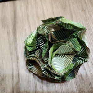 Fashion accessories designed from reclaimed vintage suit ties.